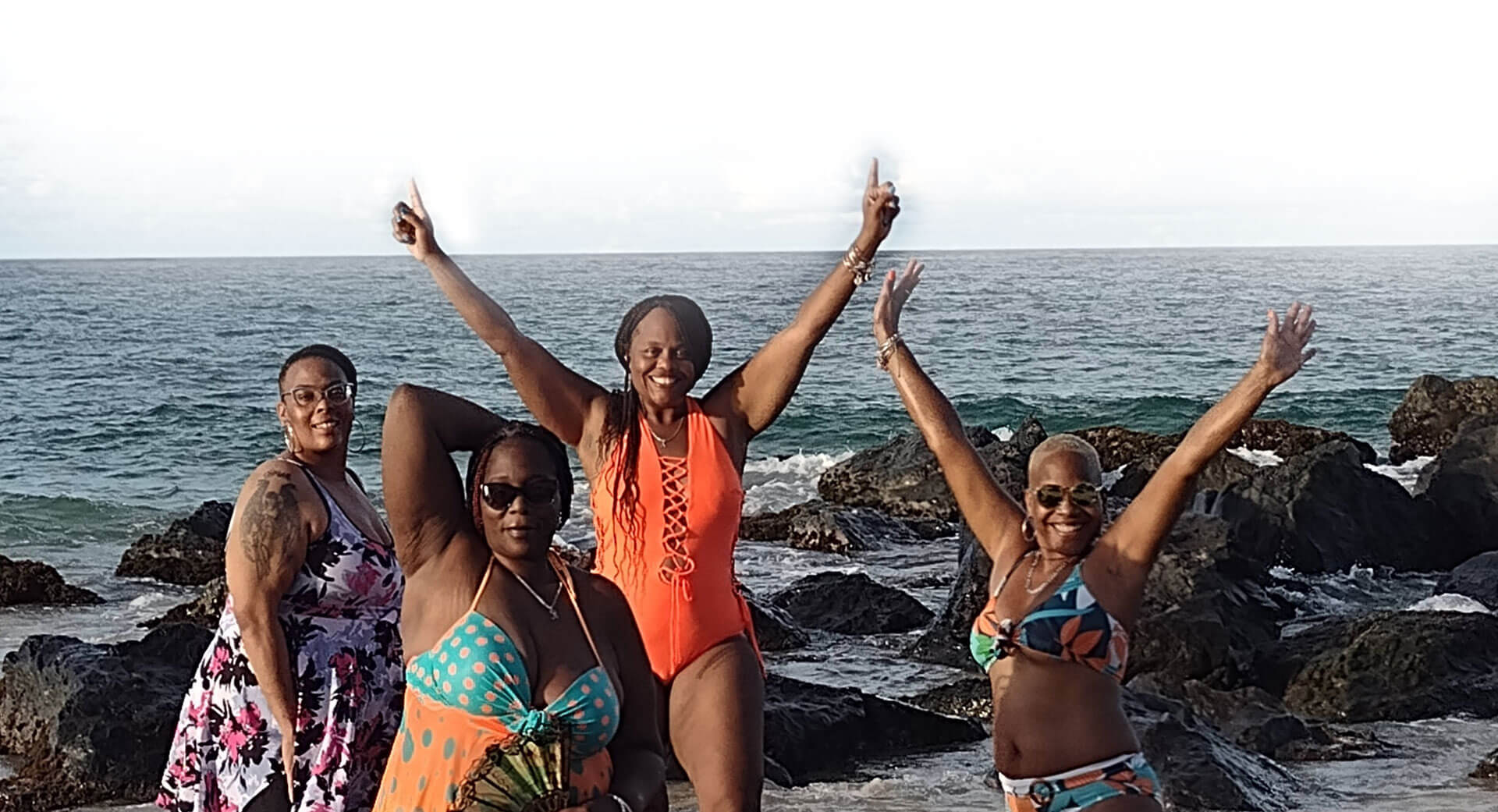 Group of Women Enjoying on Beach